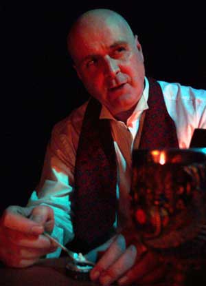 John Burns as Aleister Crowley