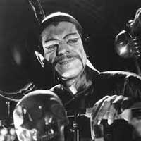 Boris Karloff as Dr Fu Manchu