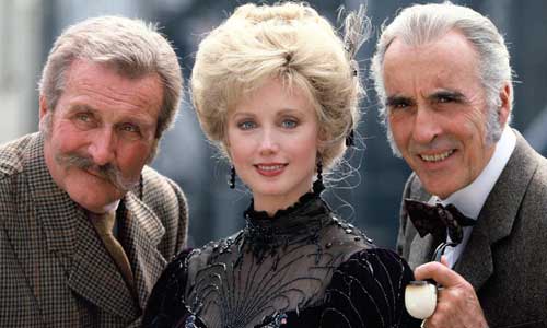 Many faces of Irene Adler, Sherlock's "The Woman" 6 Morgan Fairchild with Patrick Macnee and Christopher Lee in Sherlock Holmes and the Leading Lady