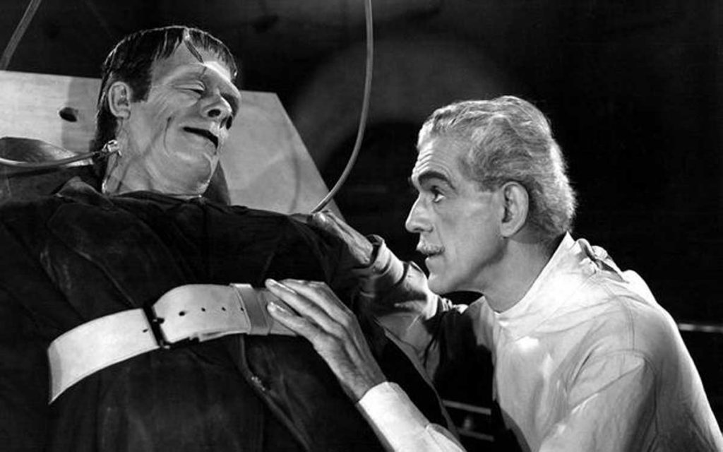 Glenn Strange and Boris Karloff in House of Frankenstein