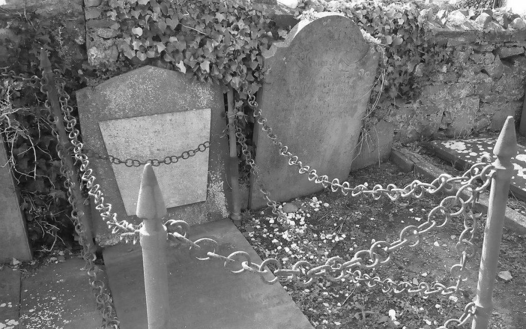 Iron stakes prevent an ancient vampire, Matthew Hassal, rising from Malew Churchyard, Isle of Man