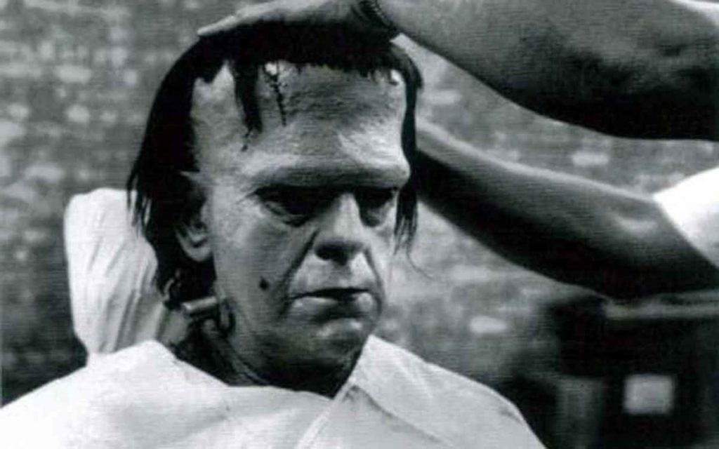 Boris Karloff gets prepared in his famous Frankenstein Monster makeup for Route 66.