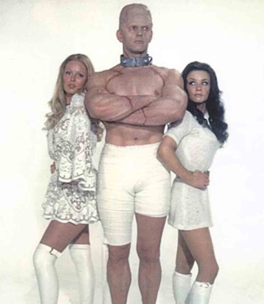 Dave Prowse with Veronica Carlson and Kata O'Mara in a Horror of Frankenstein 1970 publicity shot