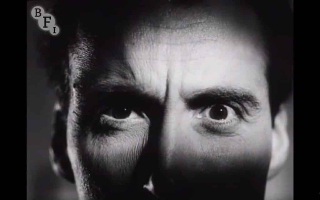 A sign of things to come: Christopher Lee gives a sinister stare in Cross-Roads (1955)