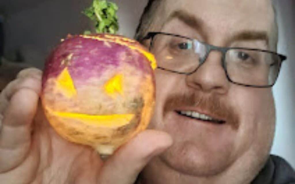 David Saunderson and his turnip Jack o'Lantern.