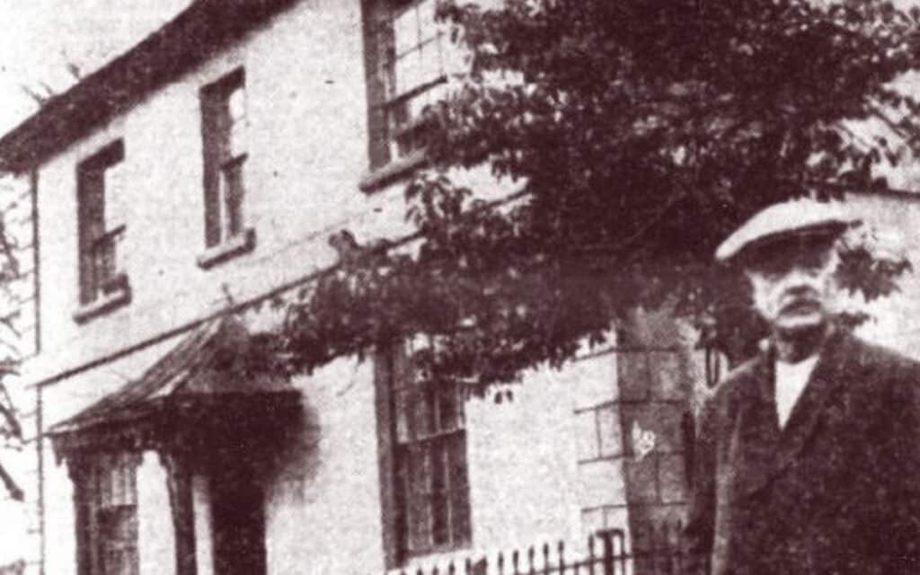 A photograph of Beit Kabir, The Ghost House, with its owner