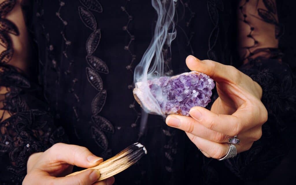 Smudging is one way you can cleanse your crystals