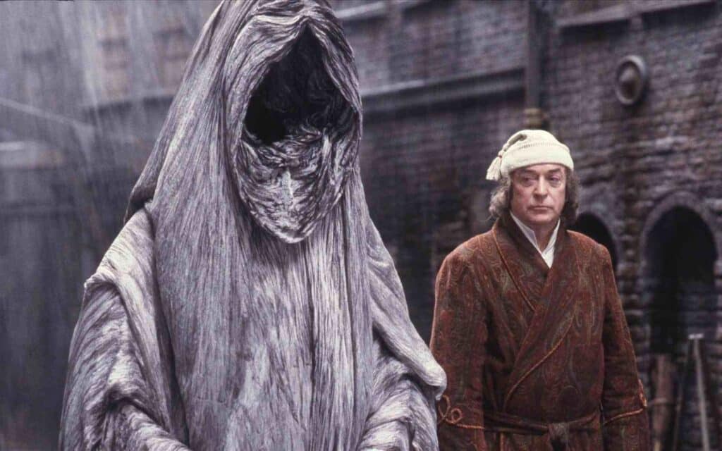 Don Austen was the puppeteer behind The Ghost of Christmas Yet to Come in A Muppet Christmas Carol 1992, seen here with Michael Caine.