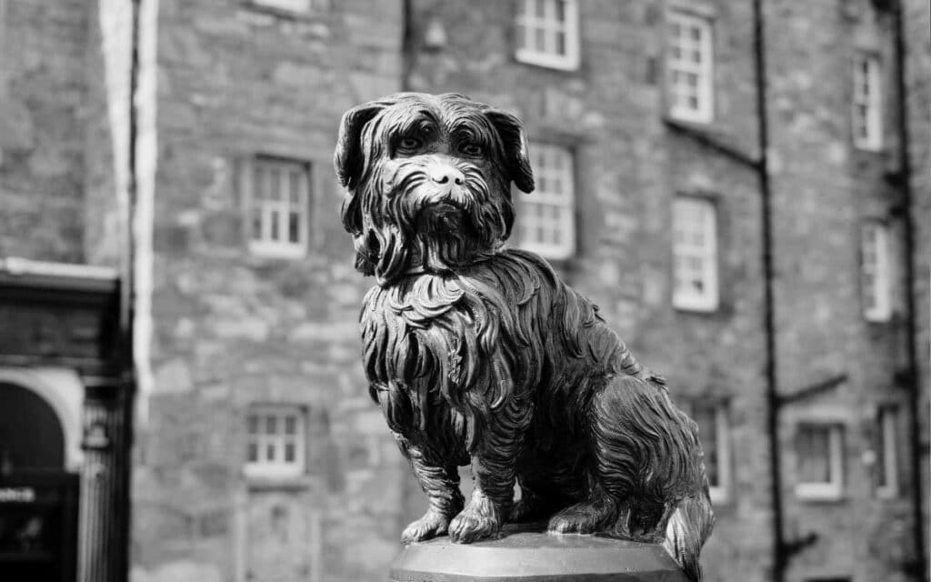 A statue of Greyfriars Bobby, a beloved dog whose spirit is said to haunt the Edinburgh cemetery.