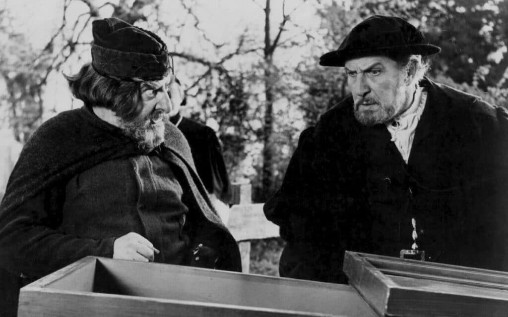 Vincent Price and Hugh Griffith in a scene from Cry of the Banshee.
