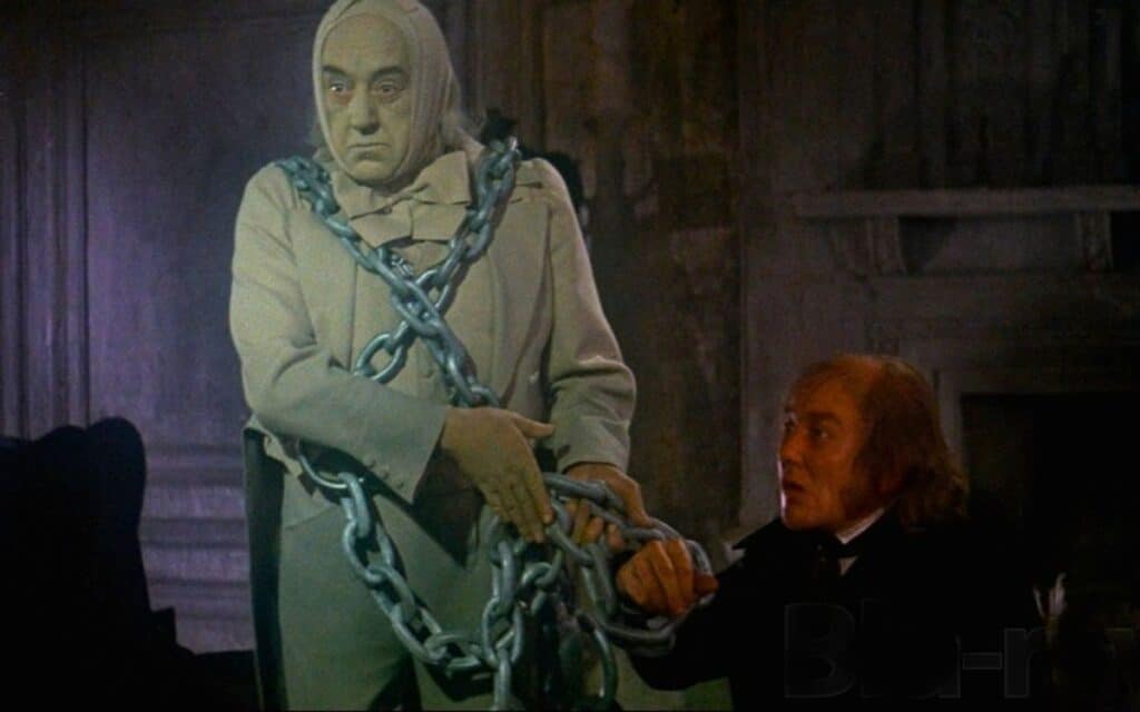 Alex Guinness as Jacob Marley in Scrooge 1970 - the first ghost of A Christmas Carol to appear before Ebenezer
