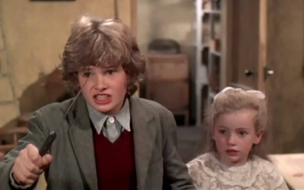 Mark Lester and Chloe Franks in Whoever Slew Auntie Roo?