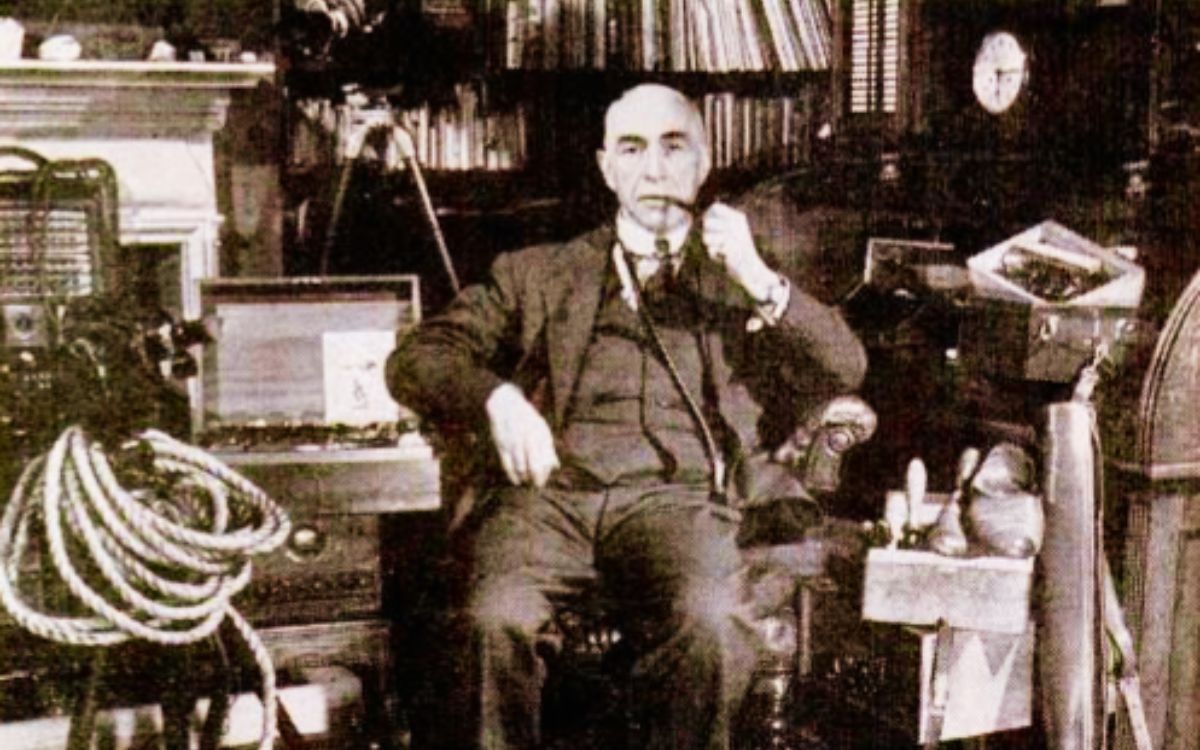 Harry Price, the famous ghost hunter, with some of the equipment he used in paranormal research.