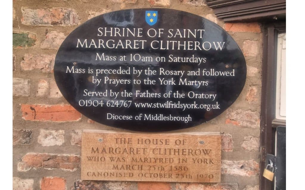Margaret Clitherow of York: Crushed to Death on Ouse Bridge 3 A plaque at the front of the Shrine of St Margaret Clitherow in The Shambles, York.