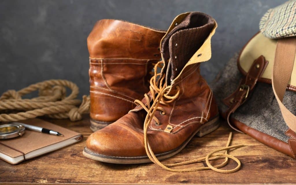Why Do We Touch Wood? 10 Common Superstitions Explained 8 Boots on table