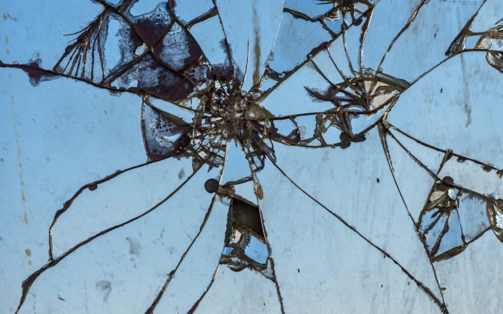 Why Do We Touch Wood? 10 Common Superstitions Explained 3 Broken Mirror